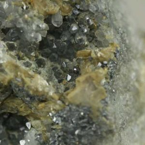 Siderite, arsenopyrite, calcite, quartz